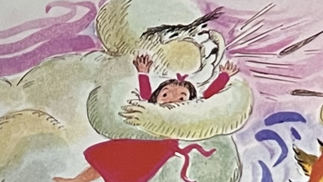 『わたげちゃん』の絵本のページの写真。わたげちゃんを風が連れ去っているイラストが描かれています。