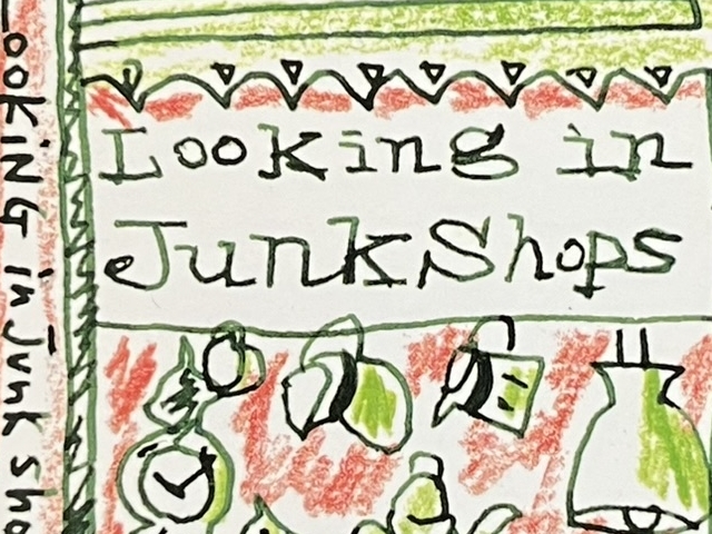 『最低で最高の本屋』の本の表紙の写真。「Looking in JunkShops」と書かれた看板？の下にジャンク品がぶらさがっているイラストが描かれています。