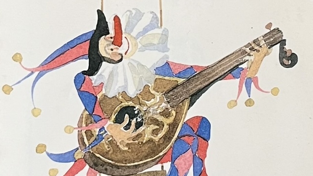 『おいしい人間』の本の表紙です。ピエロがギター？を弾いている絵が描かれています。
