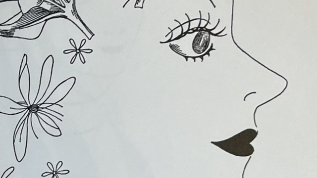 『山名文夫イラストレーション作品集』の本のページのイラストです。線で女性の顔を表現してます。