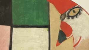 『ふしぎなかず』の絵本のページのイラストです。お目目パッチリのトンガリ鼻のピエロみたいな人が描かれています。