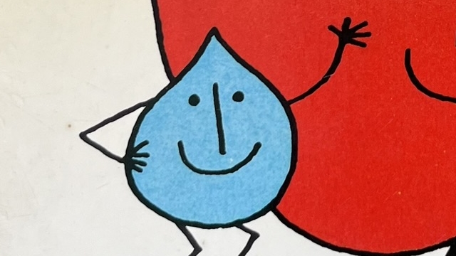 『しずくとりんご』の絵本の表紙です。リンゴの前に水色のしずくくんが手をあげているイラストが描かれています。