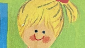 『Katy's First Day』の絵本の表紙のイラストです。女の子の絵が描かれています。
