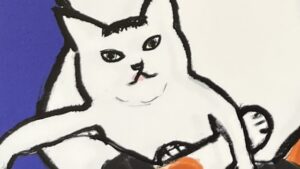 『みけねえちゃんにいうてみな』の絵本の表紙です。猫に抱かれている猫の絵が描かれています。