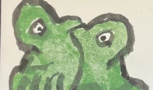 『あ・うん』の本の表紙です。緑の鳥が向き合ってくっついている絵が描かれています。