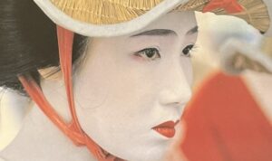 『祭』の本の表紙です。祭りの編み笠をかぶった女性の顔が写っています。