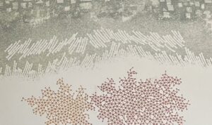 『Prova Colore』の本のページの絵です。雪をイメージさせるような赤と白の文様が描かれています。