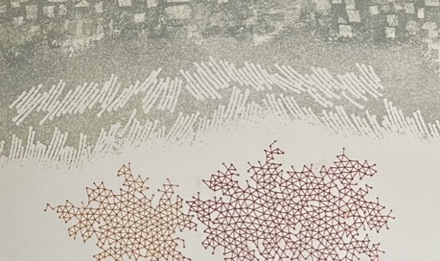 『Prova Colore』の本のページの絵です。雪をイメージさせるような赤と白の文様が描かれています。