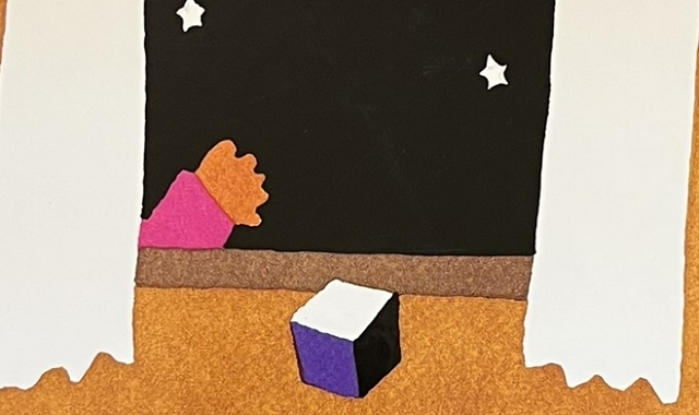 『まどからおくりもの』の絵本の表紙です。窓から投げ入れられている贈り物の絵が描かれています。