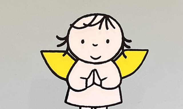 『クリスマスってなあに』の絵本の表紙です。子どもの天使の絵が描かれています。