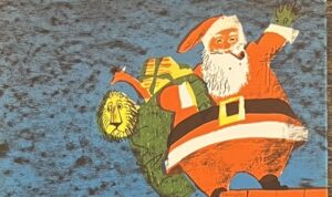 『クリスマスのまえのよる』の絵本の表紙です。サンタさんが家の煙突の上で手をあげている絵が描かれています。